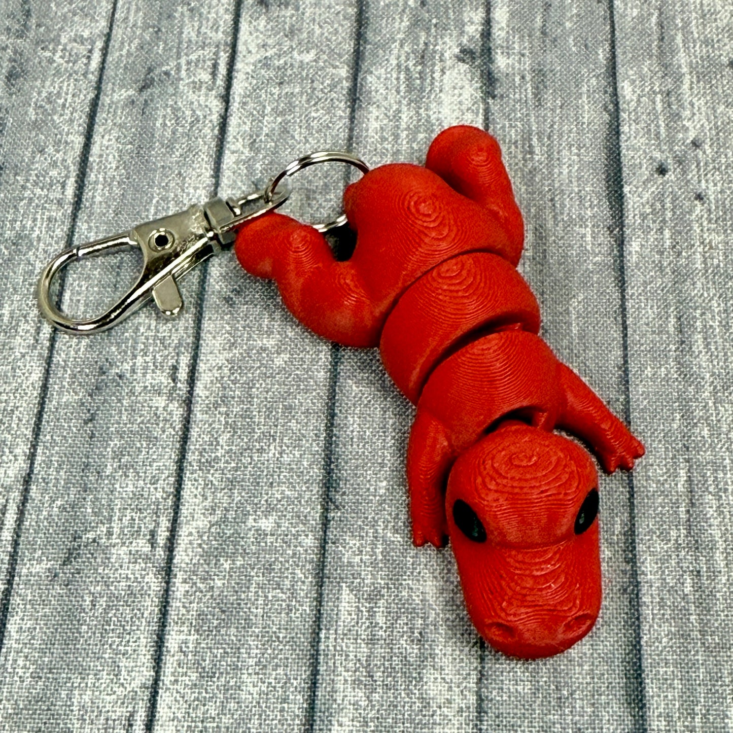 Titan T-Rex fidget toy red keychain