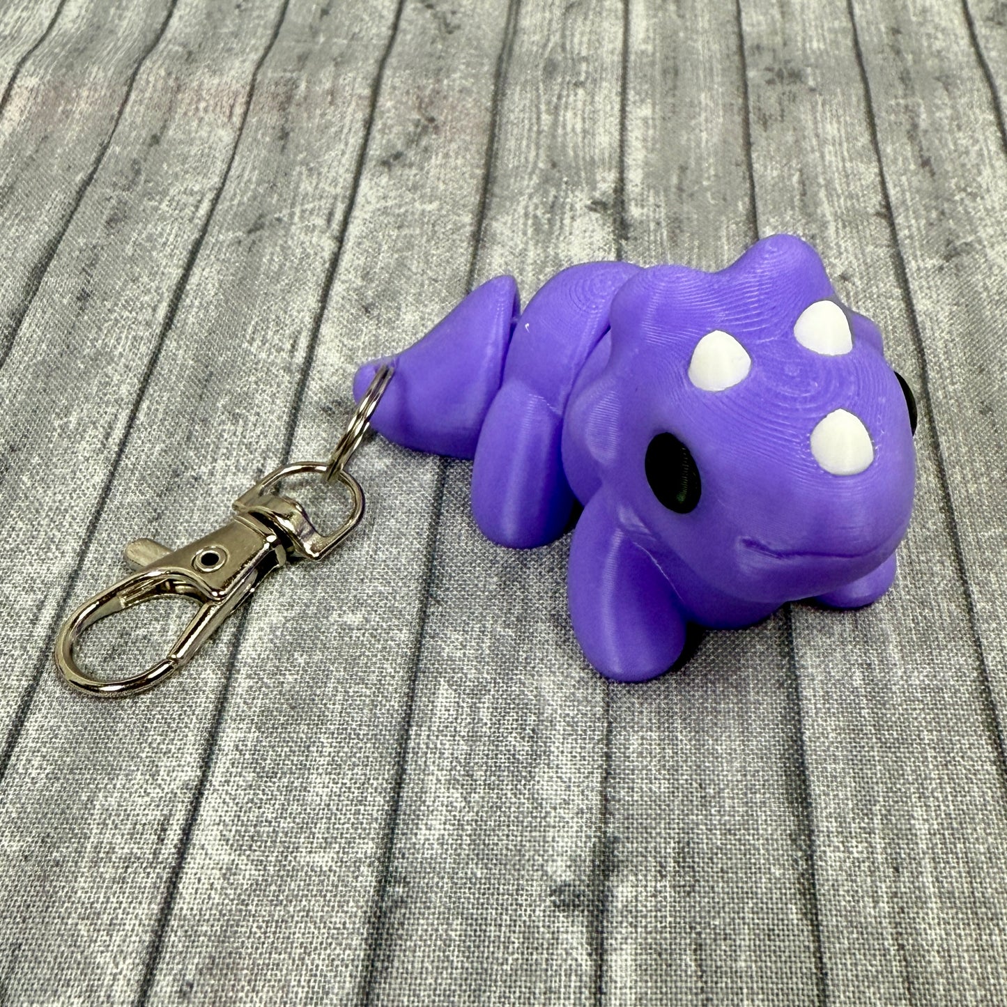 Trixie Triceratops Purple White Keychains