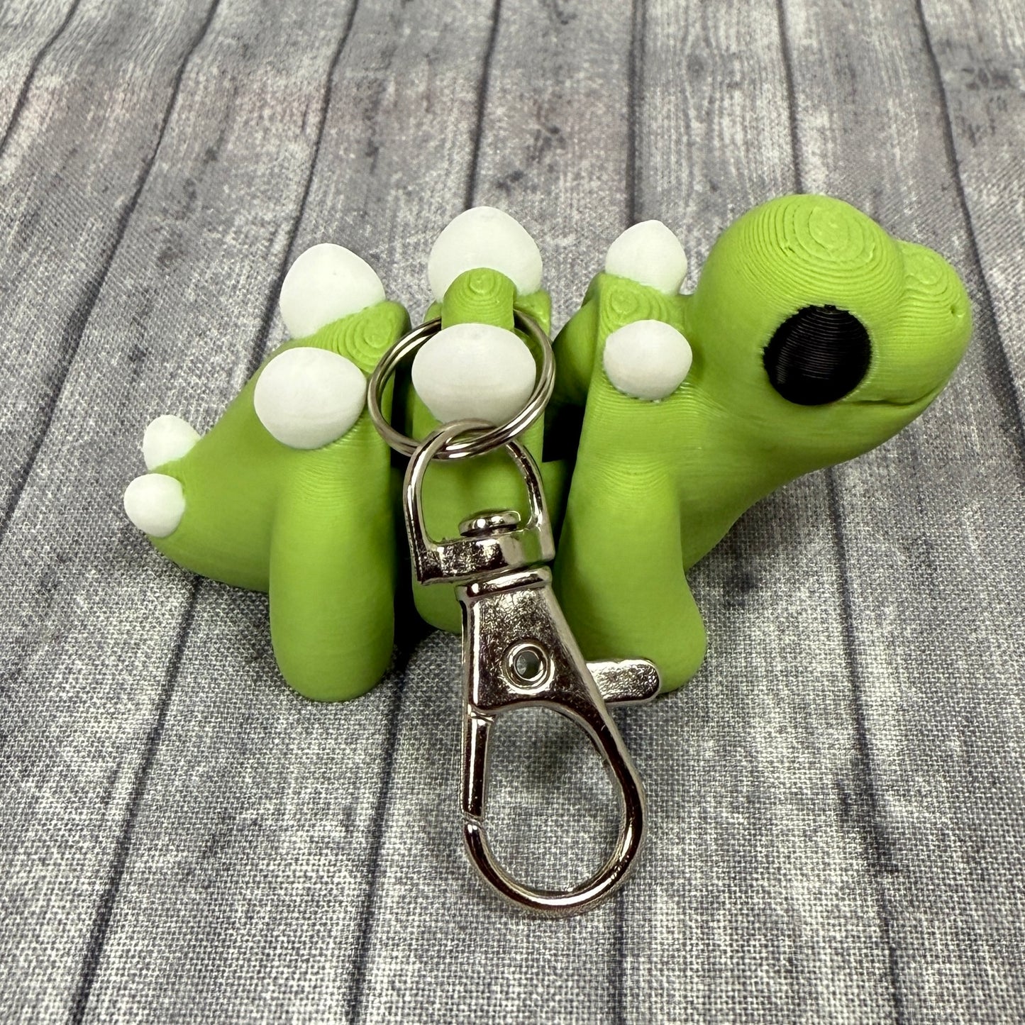 Scout_Stegosaurus_Green_White_Fidget_Toy Keychain