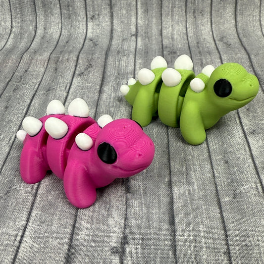 Sunny and Scout Stegosaurus Green Pink White Fidget Toy