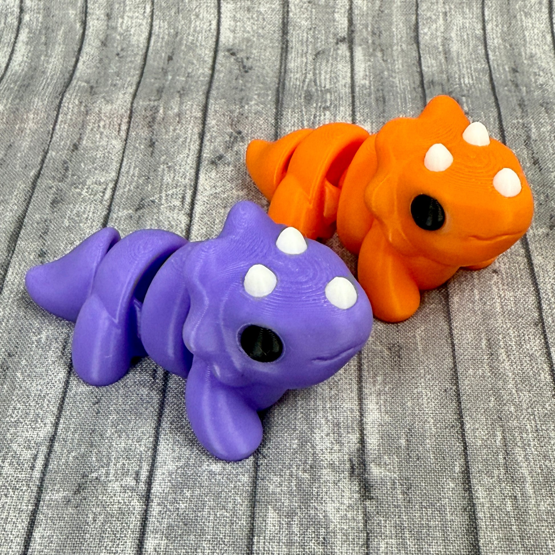 Theo and Trixie Triceratops Purple Orange White 