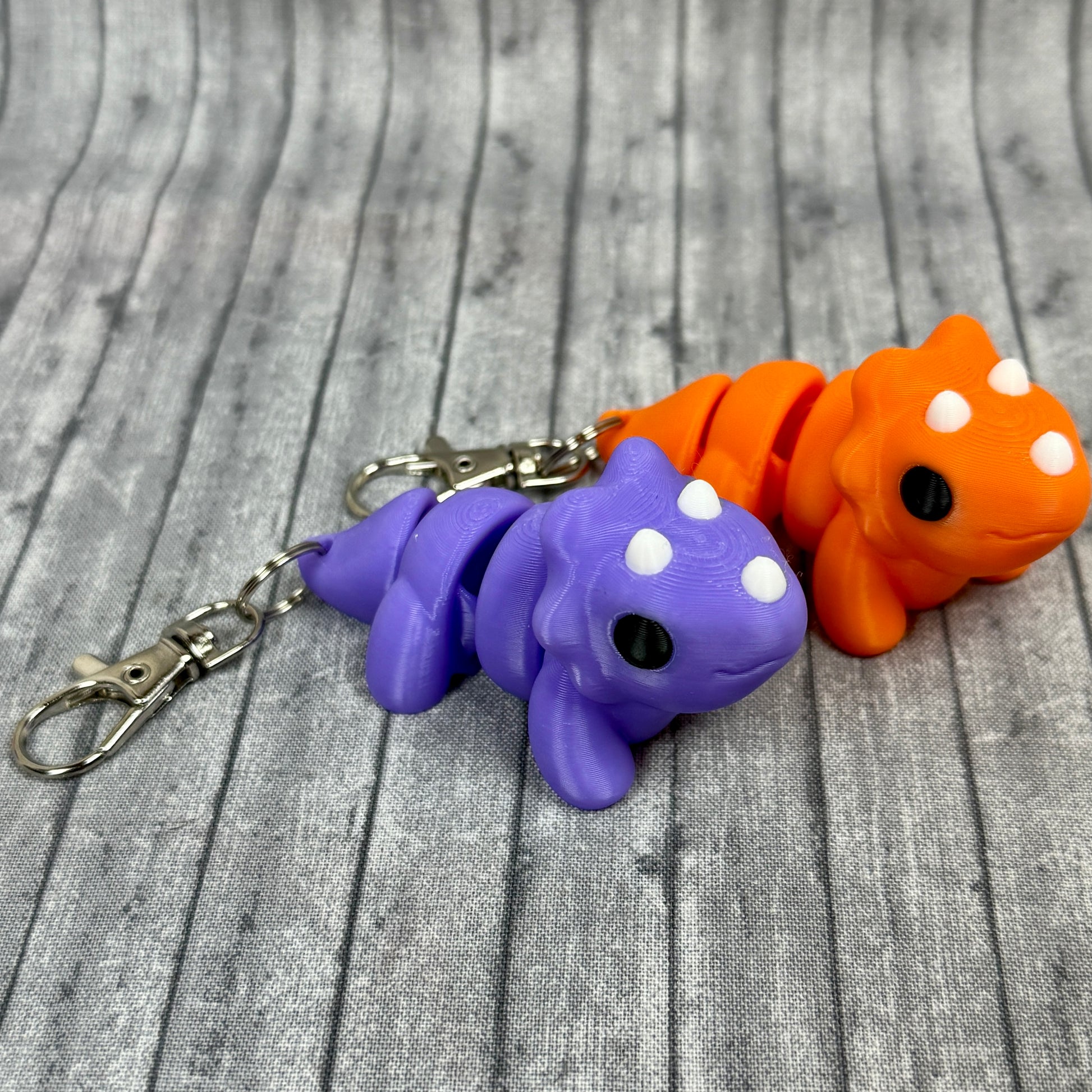 Theo and Trixie Triceratops Purple Orange White  Keychains